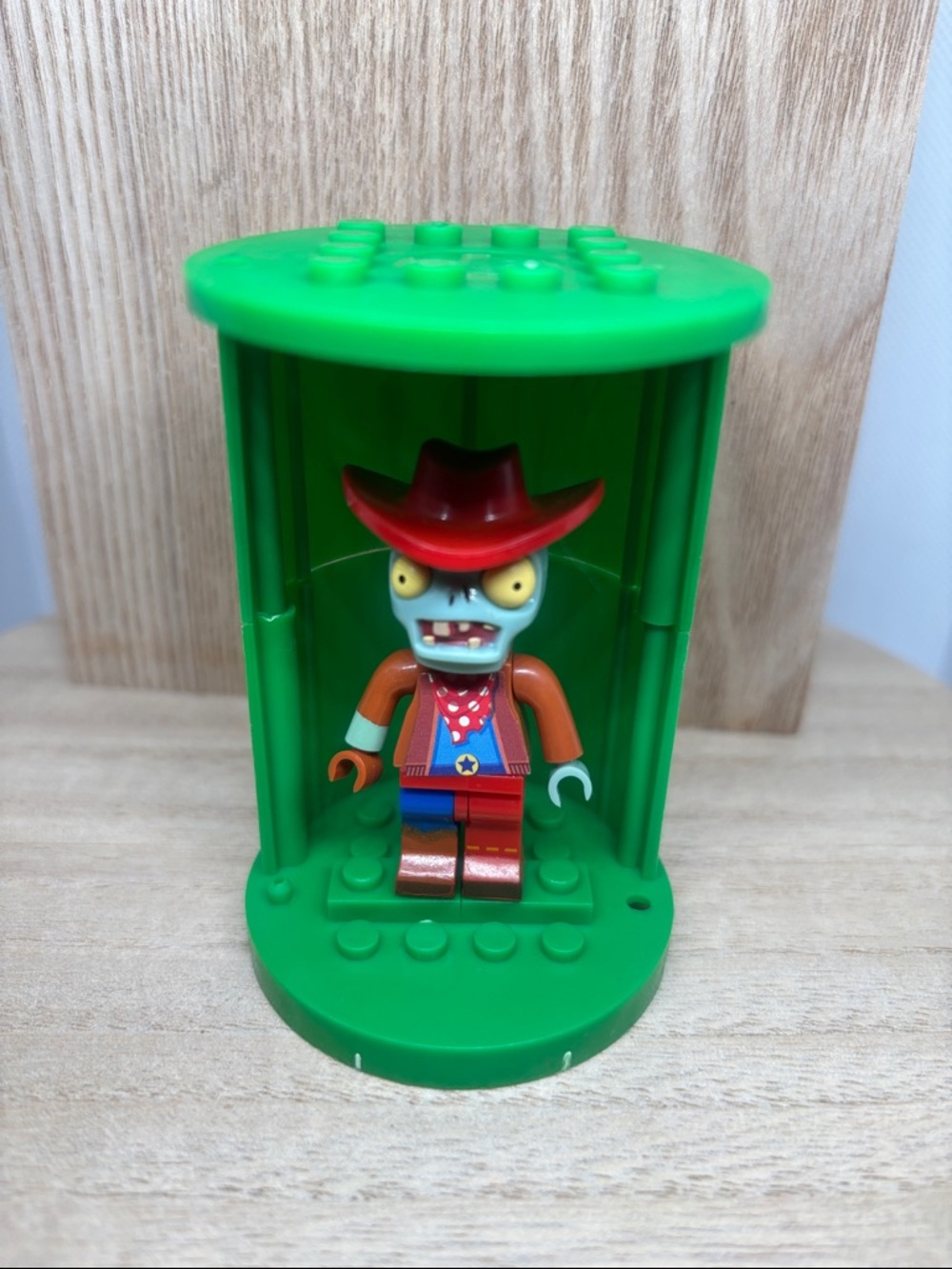 Green Minifigure Display Case with Cowboy Zombie Minifigure